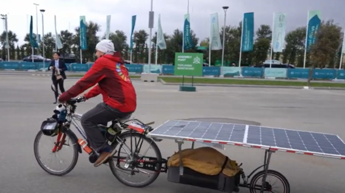 Cycling for Change: David Ligouy’s Solar-Powered Journey to COP29