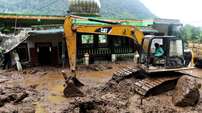 Indonesia province resumes search for 7 missing after landslide and floods kill 15