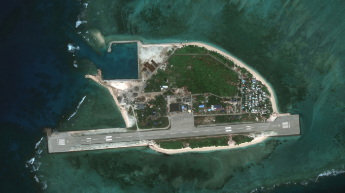 Chinese ships gather near island disputed with Philippines, satellite images show