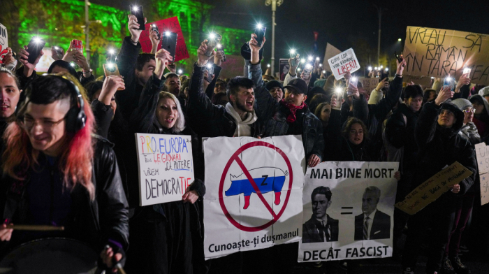 Romanians protest after court orders vote recount