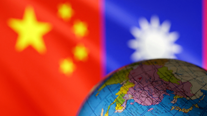 Ahead of expected war games, Taiwan urges China to 'unclench its fists'
