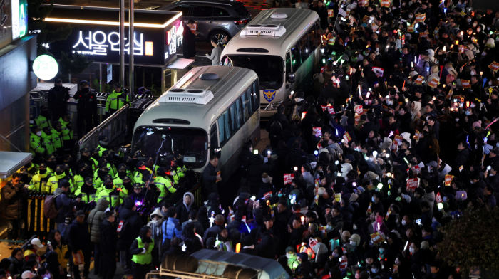 South Korea faces political crisis as president investigated over martial law