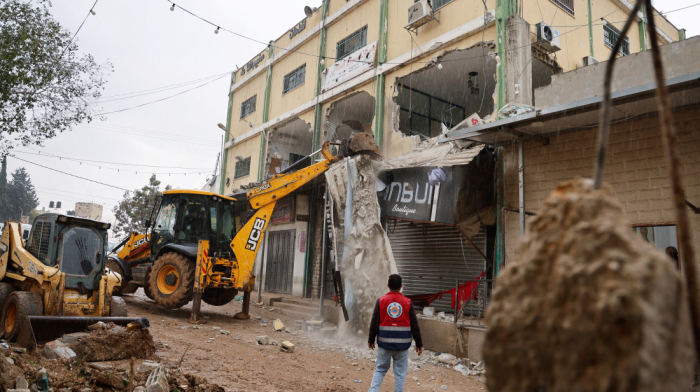 Diggers clear rubble in West Bank’s Al Faraa refugee camp after Israeli withdrawal