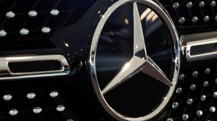 Mercedes-Benz moves to cut costs, revive sales after earnings slump