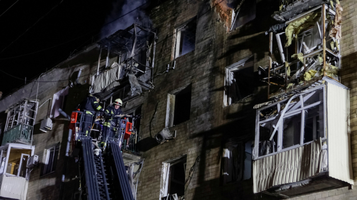 Russian drone strike sets Kharkiv apartment block on fire, injures eight