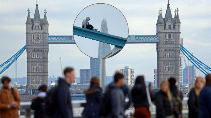 Tower Bridge in London closed after  individual climbs  over railings