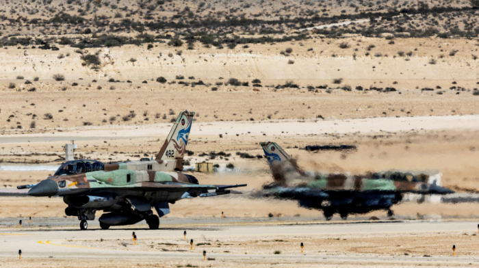 Israeli warplanes target former Syrian army bases in southern Syria, security sources say