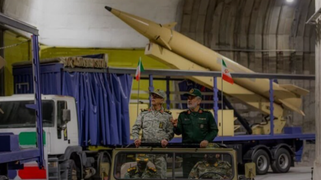 Iran unveils missile site, vows dire response to sanctions snapback