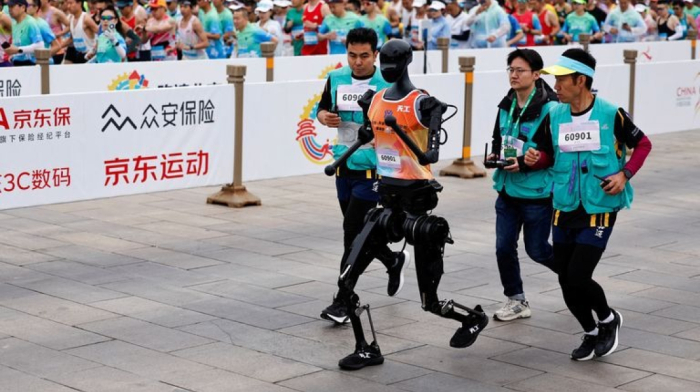 China hosts world's first robot race alongside human participants