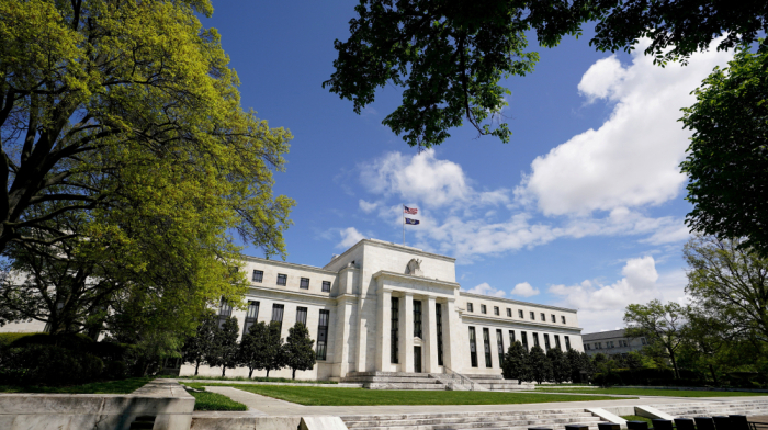 Fed holds interest rates steady amid economic uncertainty, Trump criticism