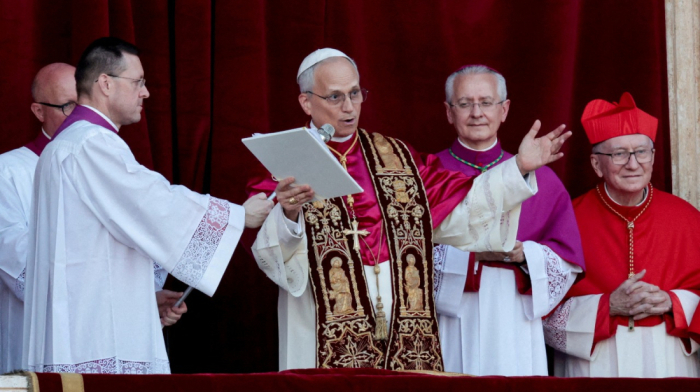 Pope Leo leads first Mass, calls for spiritual light in dark times