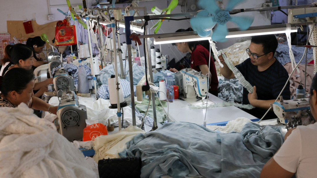 China’s factory output holds amid tariff turmoil, but retail sales and property remain weak