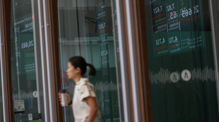Asia stocks slip as China retail falters, U.S. policy worries rattle markets