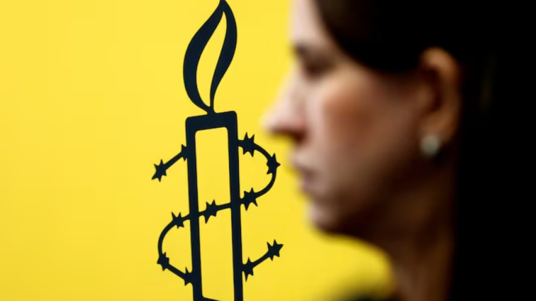 Russia bans Amnesty International, which vows to redouble work on rights abuses