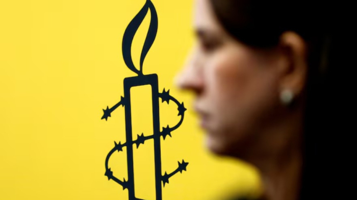 Russia bans Amnesty International, which vows to redouble work on rights abuses
