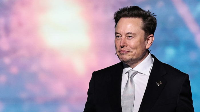 Elon Musk says he will remain Tesla CEO and plans to cut back on political spending