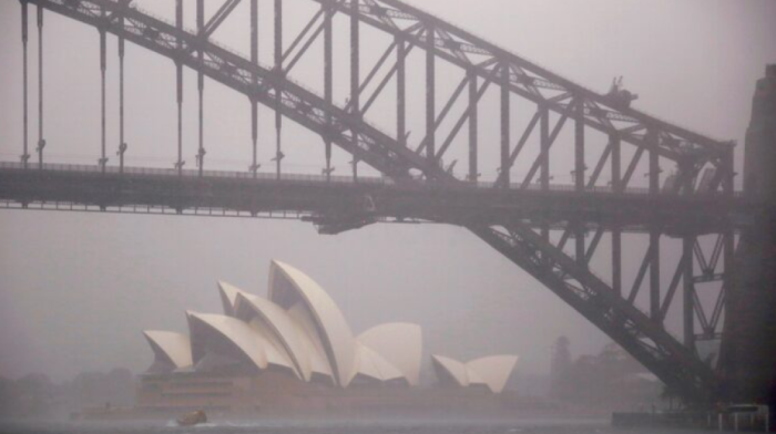 Flash floods submerge Australian towns, residents rescued from rooftops