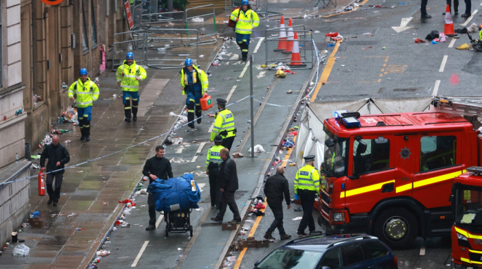 Car drives into celebrating Liverpool fans, injuring dozens