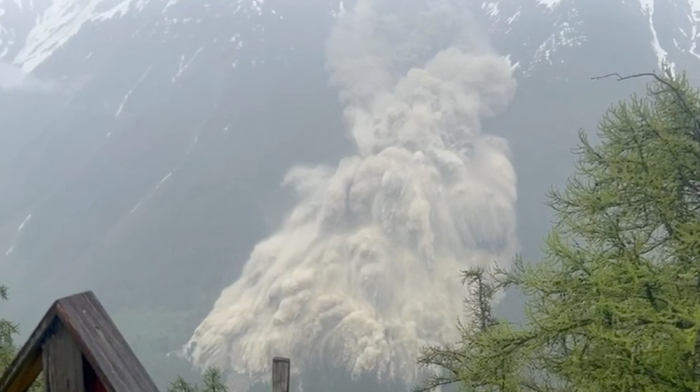 Glacier collapse in Swiss Alps buries village in mud and ice