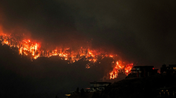 Emergency workers rush to control Canada wildfires