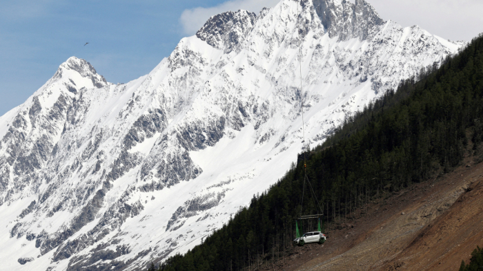 Swiss village buried by glacier collapse as debris blocks river and raises flood fears