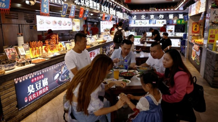 China's services sector expands in May despite U.S. tariff concerns, Caixin PMI shows