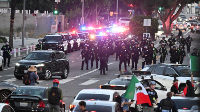 Police make 'mass arrests' in LA during nighttime curfew
