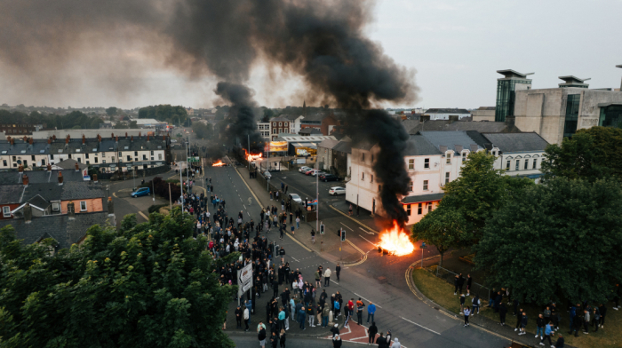 Masked rioters clash with police, set homes ablaze in Northern Ireland