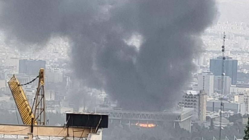 Strike hits Iranian state broadcaster headquarters during live programming