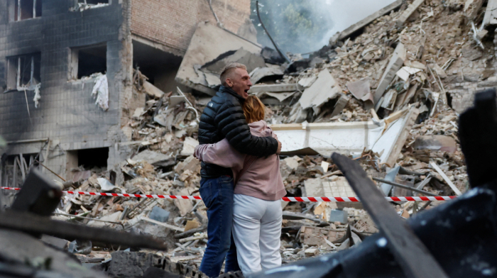 Waves of Russian missiles kill 14 in Kyiv, U.S. citizen among dead