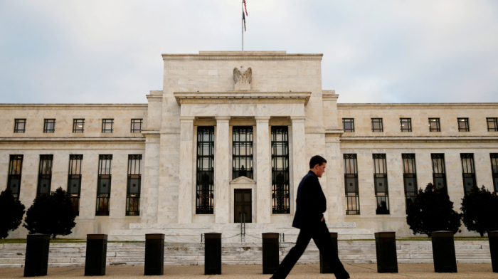 Fed holds rates steady, signals two cuts by end of 2025 amid tariff concerns