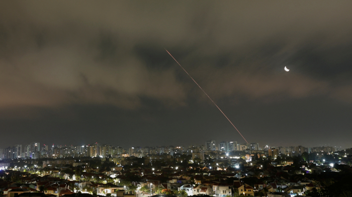 Israel says it killed veteran Iran commander as both sides attack