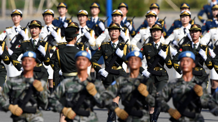 China warns Taiwan over independence remarks, boosts military readiness