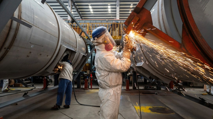 Asian factories struggle under U.S. tariff cloud despite signs of modest recovery