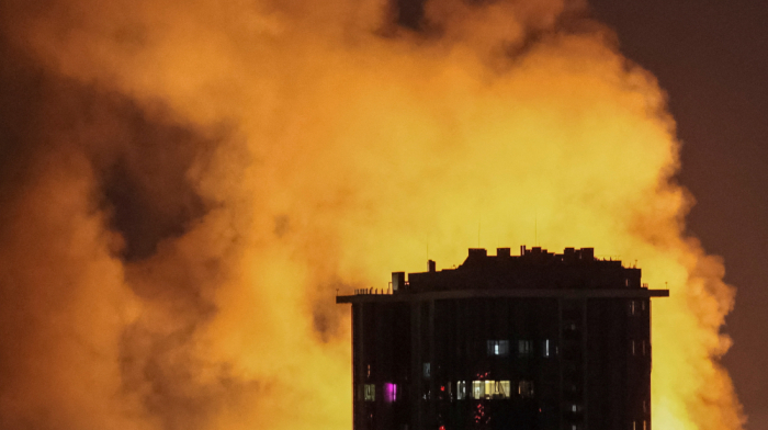Russian drone barrage hits Kyiv, injures 14 and causes widespread damage