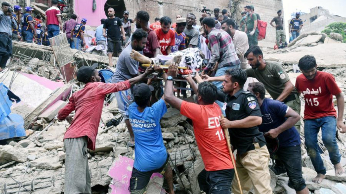 Death toll rises to 21 in Pakistan building collapse as rescue continues
