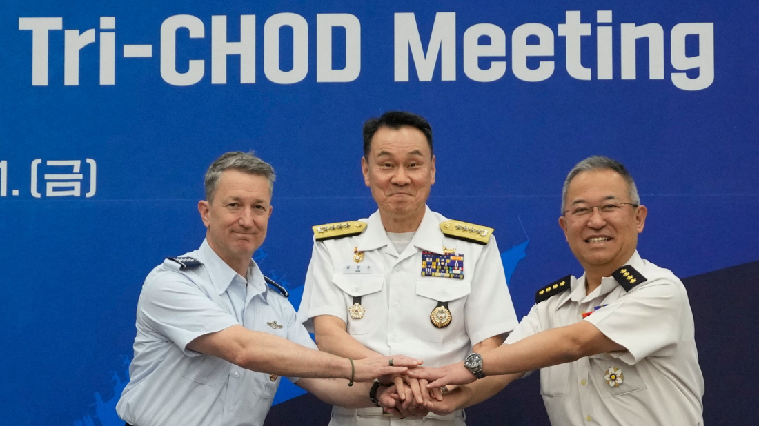 South Korea, Japan and U.S. conduct air drill as defence chiefs meet