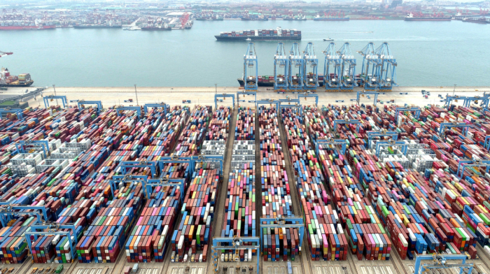 China’s exporters rush shipments as fragile U.S. tariff truce lifts June outlook, poll suggests