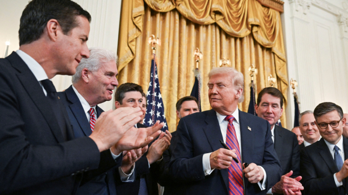 Trump signs landmark crypto bill into law