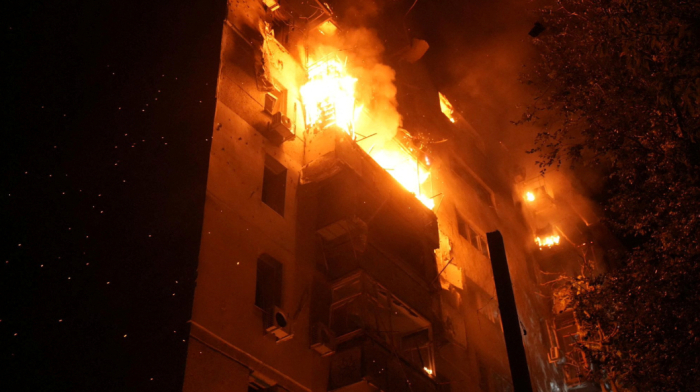 Russian drone attack kills one in Odesa, sets apartment building on fire