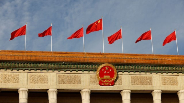 China bars U.S. patent official from leaving country
