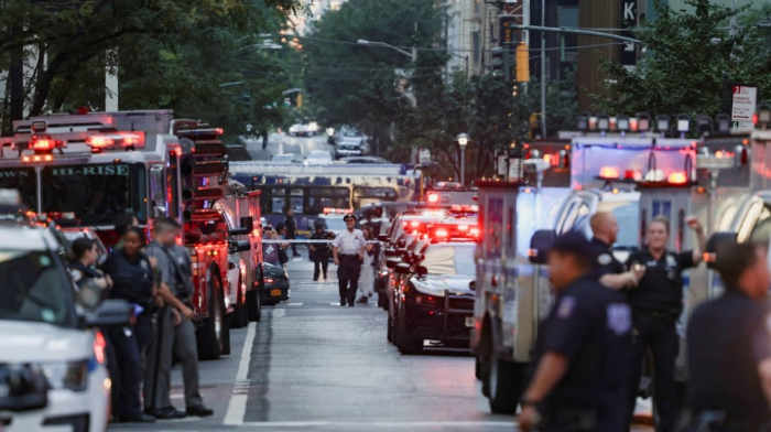 Gunman kills four, including police officer, in Manhattan skyscraper shooting
