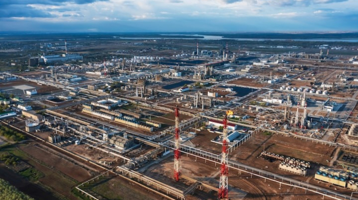 Ukraine says it hit Russian oil sites and military airfield in drone strikes