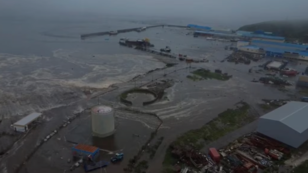 Russia cancels tsunami warning for Kamchatka after quake, dormant volcano erupts