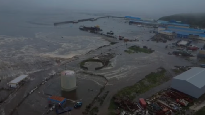 Russia cancels tsunami warning for Kamchatka after quake, dormant volcano erupts