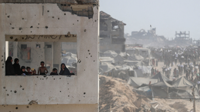 Hamas says it will allow aid for Gaza hostages if Israel halts airstrikes