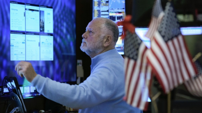 Apple boosts Nasdaq as Wall Street closes higher