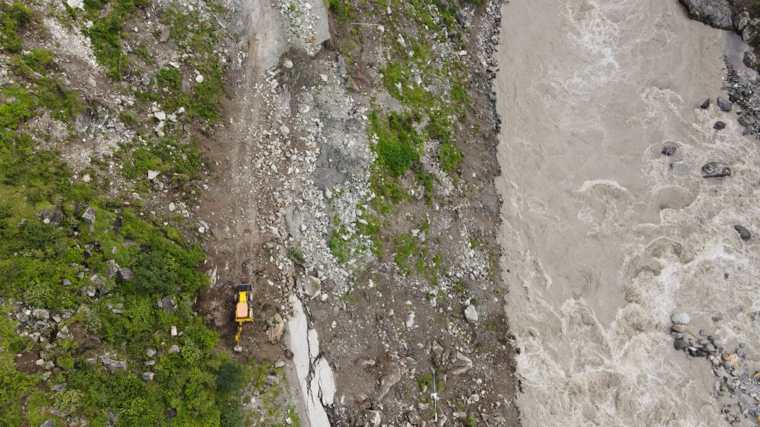 Indian helicopters rescue people stranded by flooding in Himalayan state