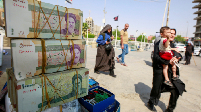Iran approves plan to cut four zeros from rial amid currency drop