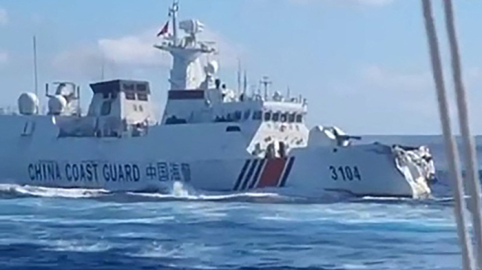 Chinese navy and coast guard vessels collide near disputed shoal during chase of Philippine ship
